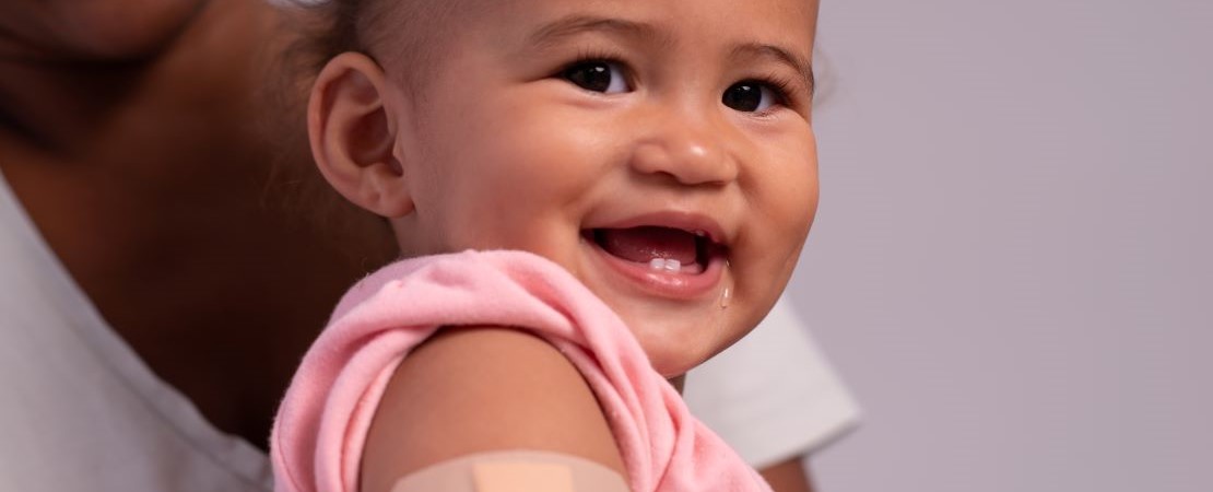 female doctor and mother with baby